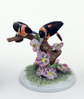 BIRDS ON A FLOWERY BRANCH