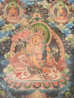 Thangka, Jambhala ábrázolással. Tibet vagy Kína, XX. sz. első fele, nyomat, vászon. 89x68 cm, korának megfelelő állapotban, hátulján kopott, foltos, feltekerve.